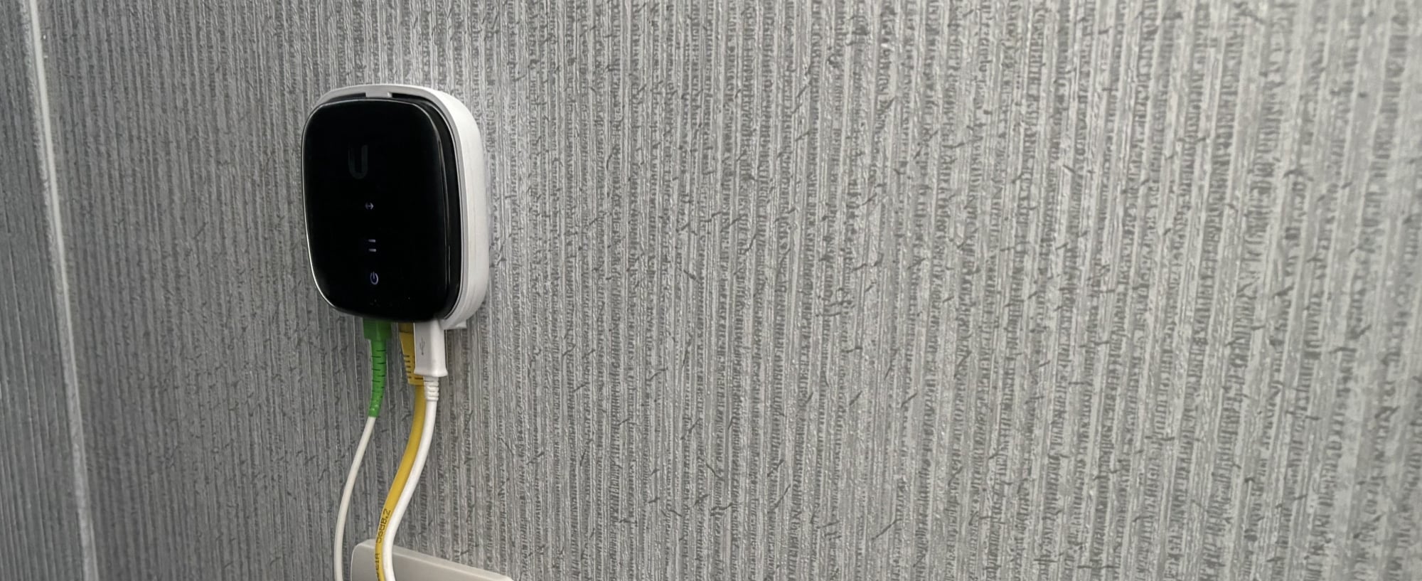 Fibre ONU installed neatly on an interior wall